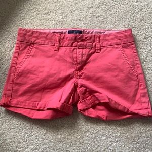 red jean shorts